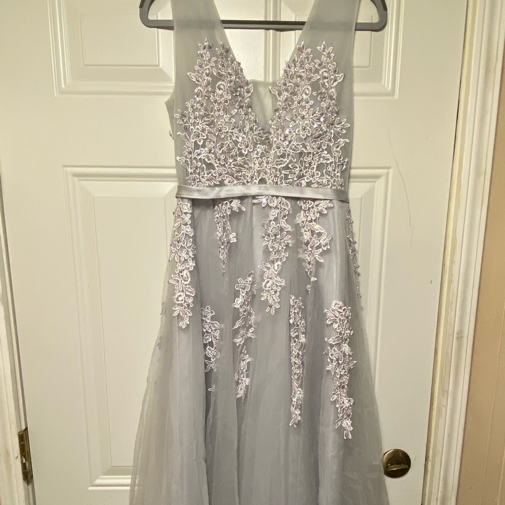 Brand new, never worn silver Wedding/prom dress